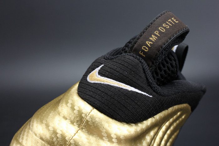 air foamposite pro “metallic gold” black mens 624041-701